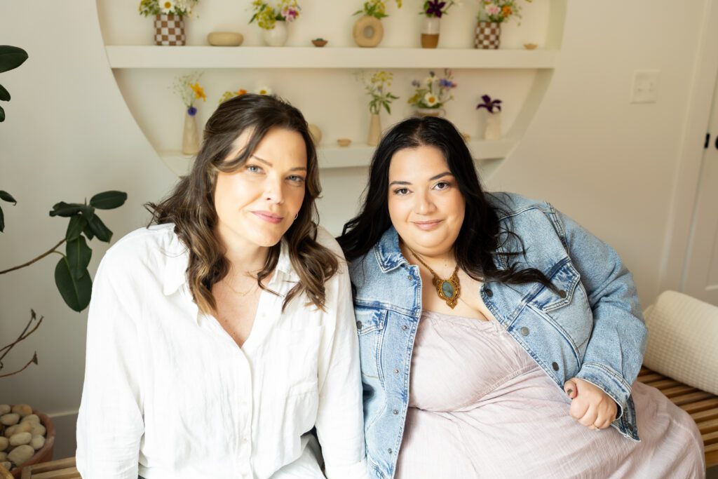 two women smiling during brand photography session