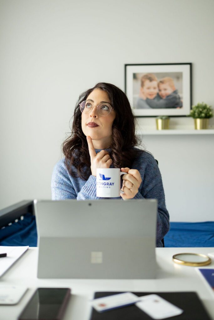 nurse checking on patient at bedside during healthcare brand photography session