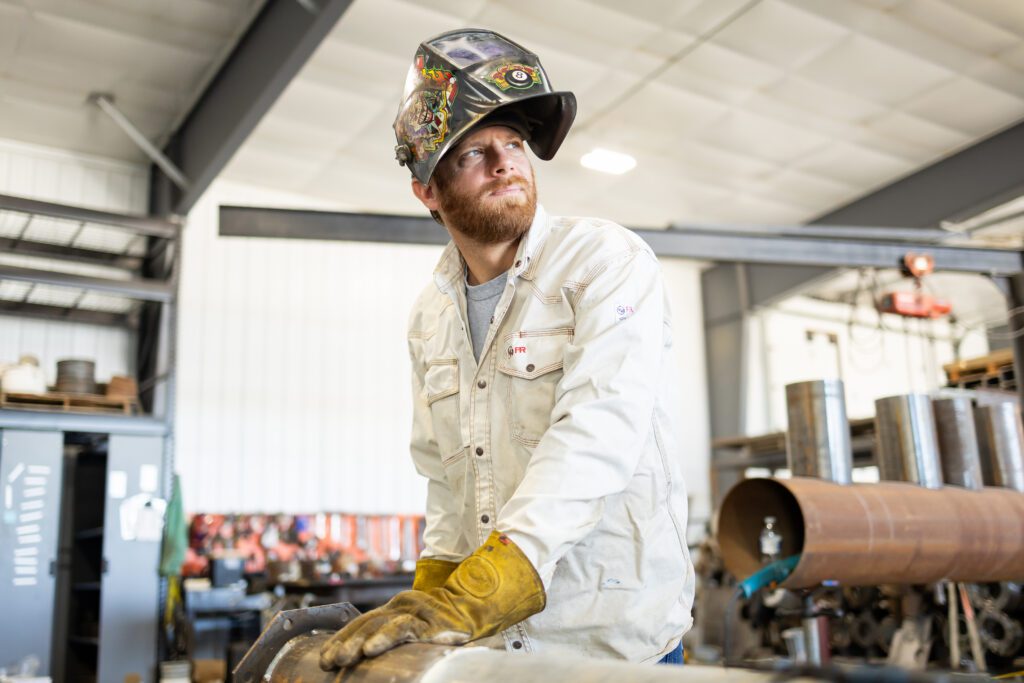 welder preparing for work in industrial brand photography session