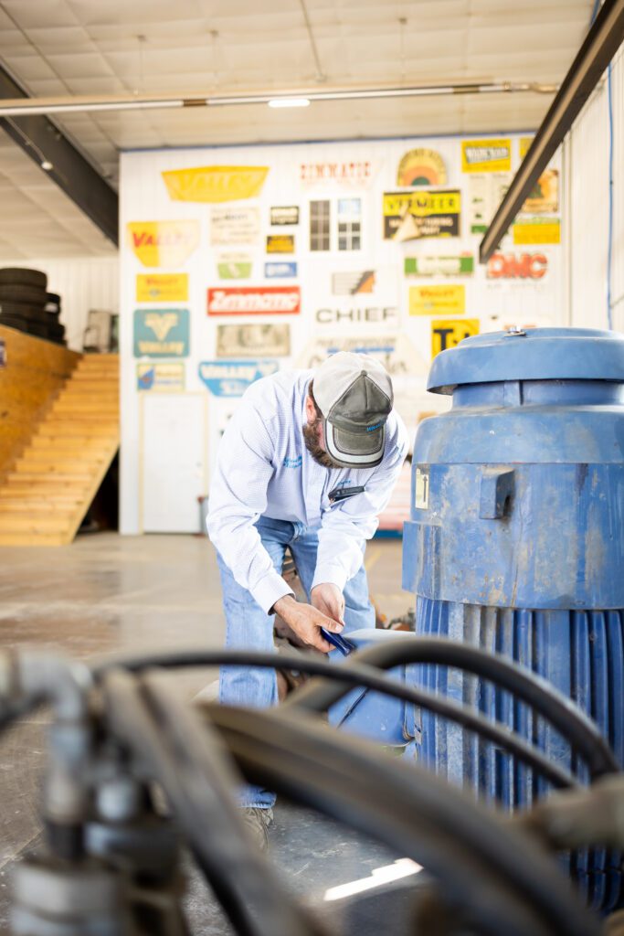 worker operating machinery in industrial environment