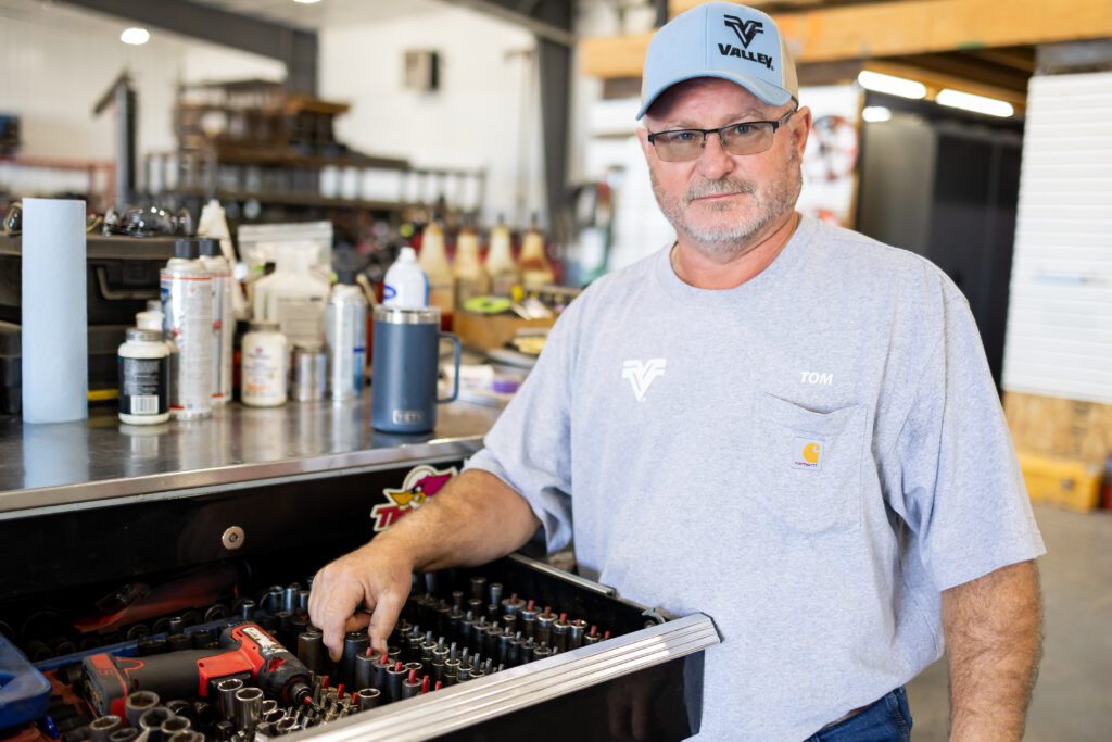 technician portrait in workshop setting during brand photography